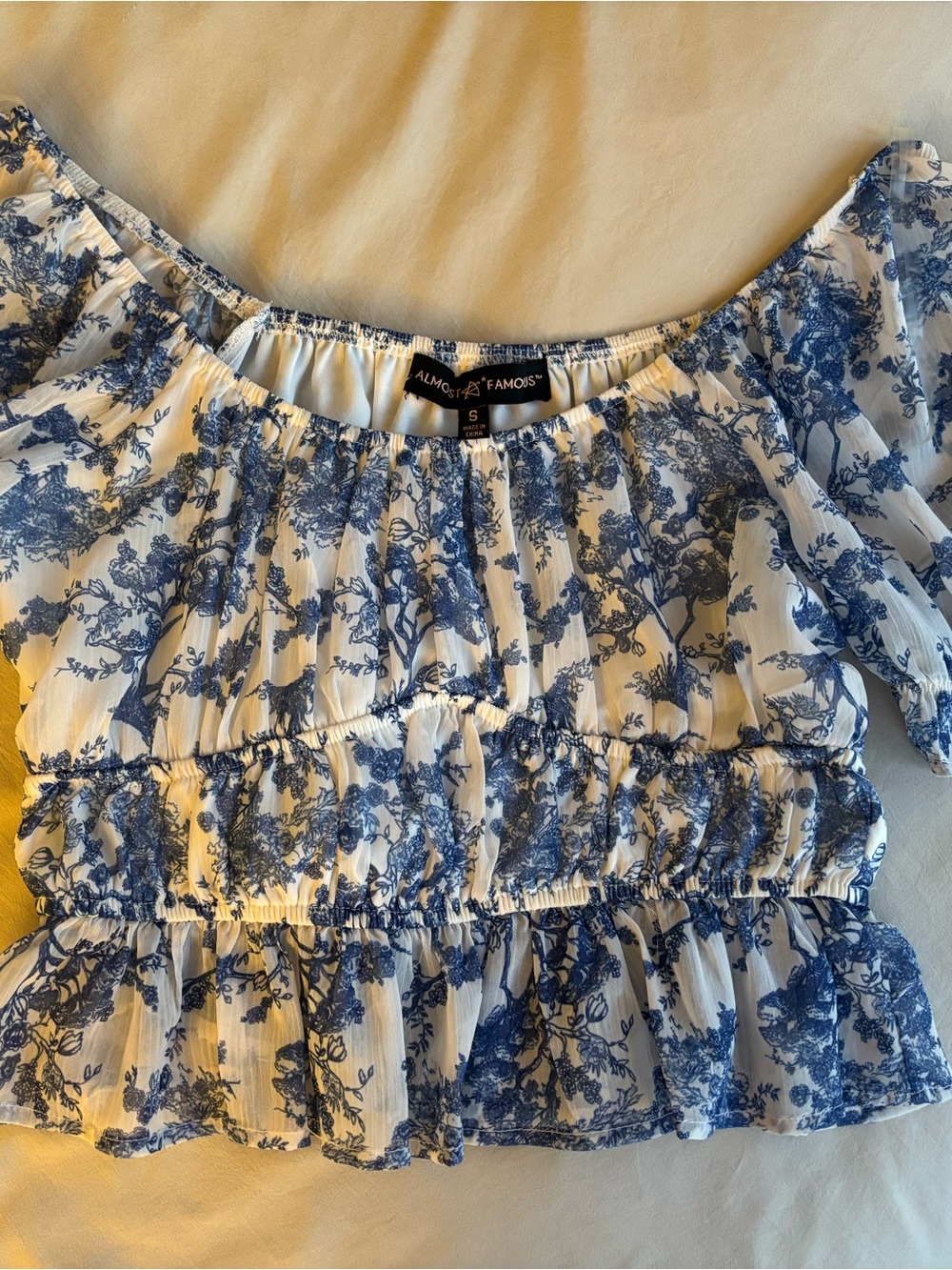 Almost Famous White and Blue Floral Off-Shoulder Crop Top